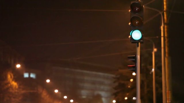 night city, traffic light, bus stops at a traffic light, close up