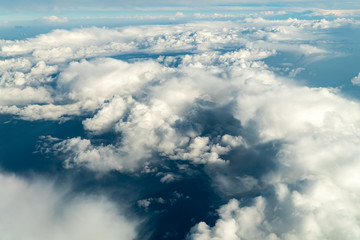 Fototapeta na wymiar Flying Through Beautiful Landscape Of Earth Clouds