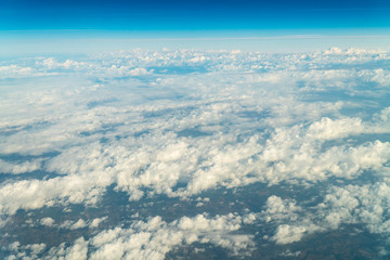 Naklejka na ściany i meble Flying Through Beautiful Landscape Of Earth Clouds