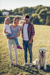 Happy family with dog