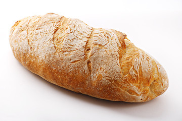 Bread loaf. Wholegrain wheat bread on white background