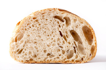 Bread loaf sliced in half. Wholegrain wheat bread on white background