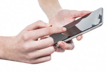 a female hand holds an phone