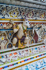 High Relief Sculpture of animal and monster decorated with ceramic, Wat Pariwat Temple,Bangkok,Thailand