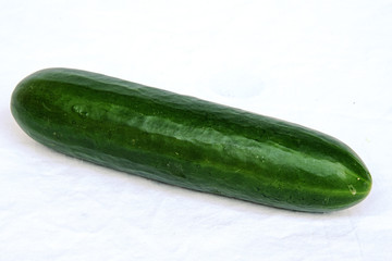 green cucumber on a white background