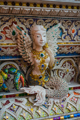 Obraz premium High Relief Sculpture of animal and monster decorated with ceramic, Wat Pariwat Temple,Bangkok,Thailand