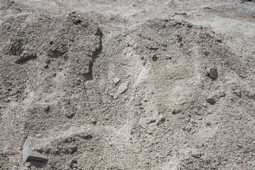 A pile of gray sand