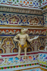 Fototapeta na wymiar Traditional Thai style sculptures and painting of monster,animals and gods in church under decoration of Wat Pariwat