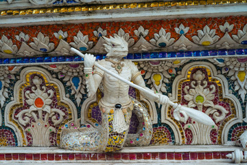 Traditional Thai style sculptures and painting of monster,animals and gods in church under decoration of Wat Pariwat