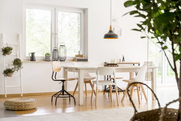Dining room with braided pouf