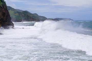 Timang extreme beach in Gunungkidul nearby crossing to Watu panjang island in Yogyakarta, Indonesia.