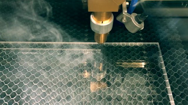 Engraving plastic plate with laser.