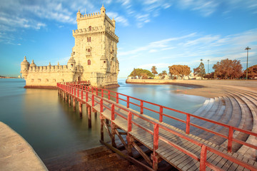 Belem Tower at low tide in the morning. Torre de Belem is Unesco Heritage and symbol of Lisbon, in Belem District on Tagus River. Belem Tower is the most visited tourist attraction in Lisbon, Portugal