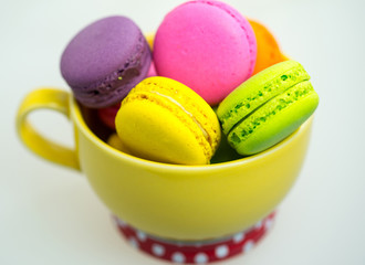 Close up colorful macarons dessert with vintage pastel tones