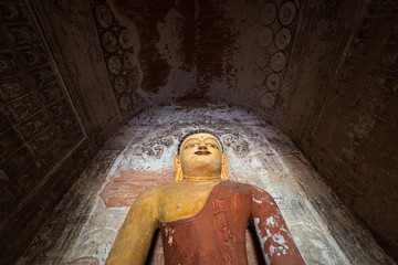 Statue of Buddha in the Hti Lo Min Lo Temple in the World Heritage SIte of Bagan, Myanmar
