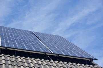 Photovoltaic panels on the roof of a residential building