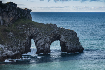 Fototapeta premium San Juan de Gaztelugatxe hermitage natural bridge at dusk