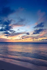 Afwasbaar Fotobehang Zonsondergang aan zee Beautiful beach scene with  sea and sunset sky