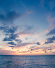 Beautiful beach scene with  sea and sunset sky