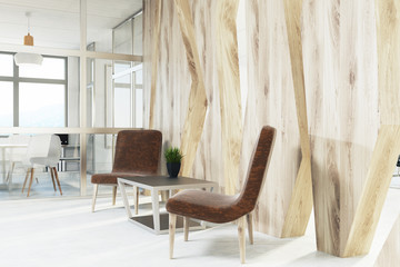 Brown armchairs waiting area, wood, closeup