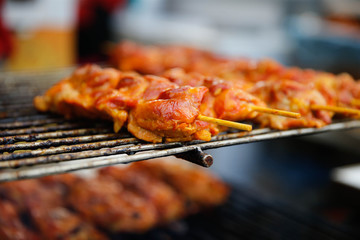 Making BBQ chicken on sticks at the Minnesota State Fair