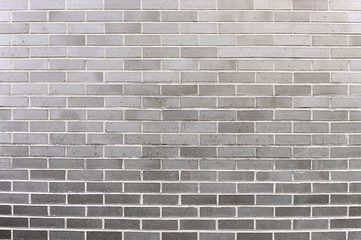 Old grey brick wall background