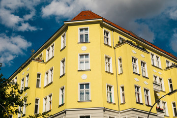 Fototapeta na wymiar yellow house with darken sky