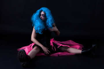 Fototapeta na wymiar portrait of girl with makeup scary dolls and blue hair