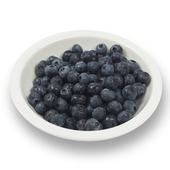 Blueberries on a white plate isolated on white background. Clipping path