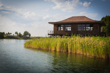 Fototapeta na wymiar Chinese style house on the lake shore.