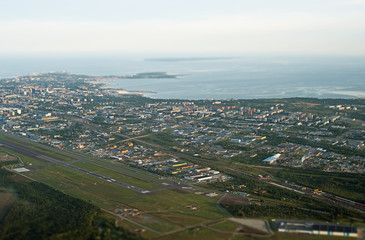 Fototapeta na wymiar View from the plane to Tallinn airport and Lasnamae district.