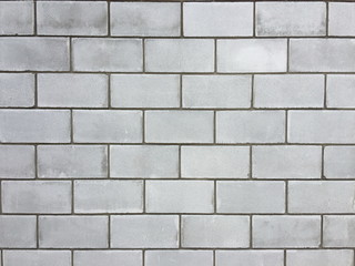 Obraz premium Wall from a large cinder block, a brick wall for a background. Close-up .