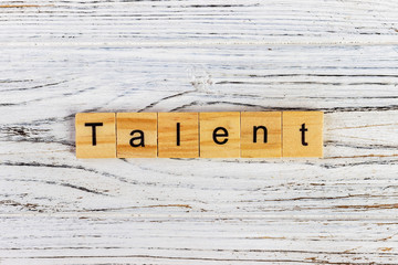 the word of TALENT on wooden cubes