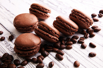 Sweet and colourful french macaroons or macaron with coffee