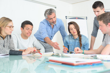 young people teacher discuss communicate university classroom