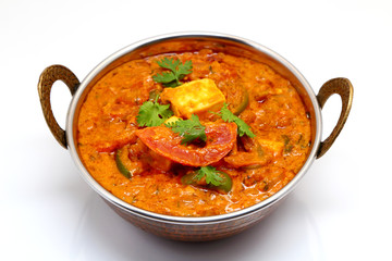 Indian Food or Indian Curry in a copper brass serving bowl.