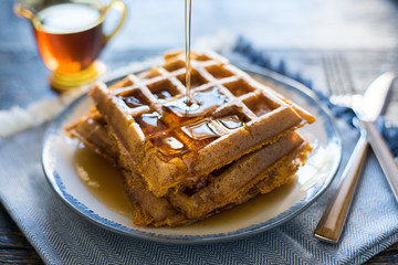 Pouring Syrup on Pumpkin Waffles - 170880100