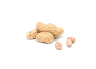 Dried peanuts in closeup on white background.