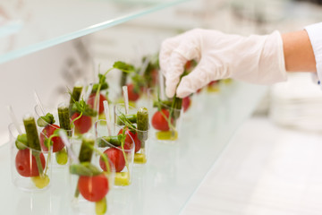 Mini canapes vegetable snacks in plastic cups canapes