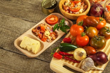 Homemade salad of tomato, cheese and chili peppers. Healthy diet food. Healthy breakfast.