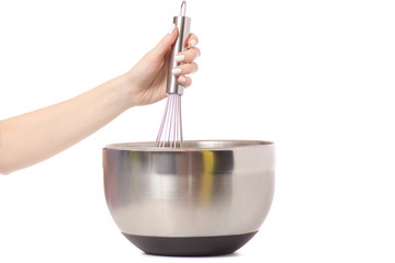 Female hand kitchen whisk bowl