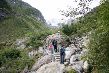 Fototapeta na wymiar People go to Buer glacier, Norway