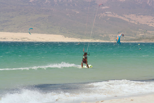 surfing on the parachute developed on the coasts of oceans and seas.