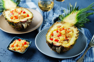 Bacon chicken pine apple vegetables fried rice in pineapples