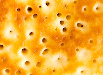 Pancake close-up photo. Baked pancake or bakery bubbled surface.