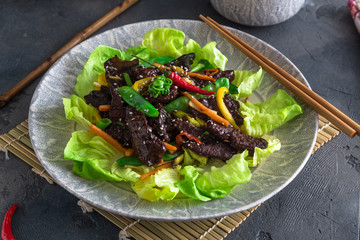 Fried turkey liver asian style with vegetables and many greens. Served with bowl of rice and tea