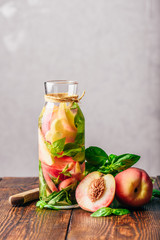Infused Water with Peach and Basil.