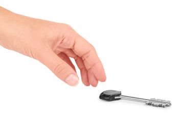 metal key with plastic handle in hand isolated on white background