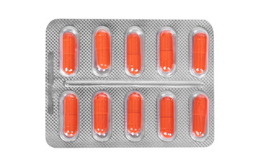 Medicine pills packed in blisters isolated on white background