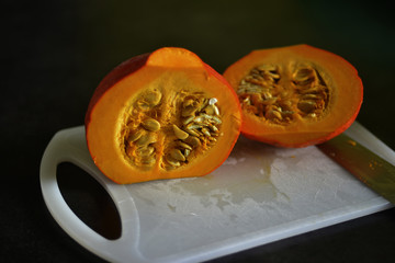 Cut pumpkin with seeds